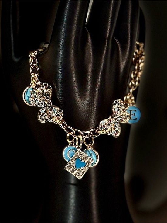 Jewelry - Gold Butterfly and Snake Charm Bracelet
